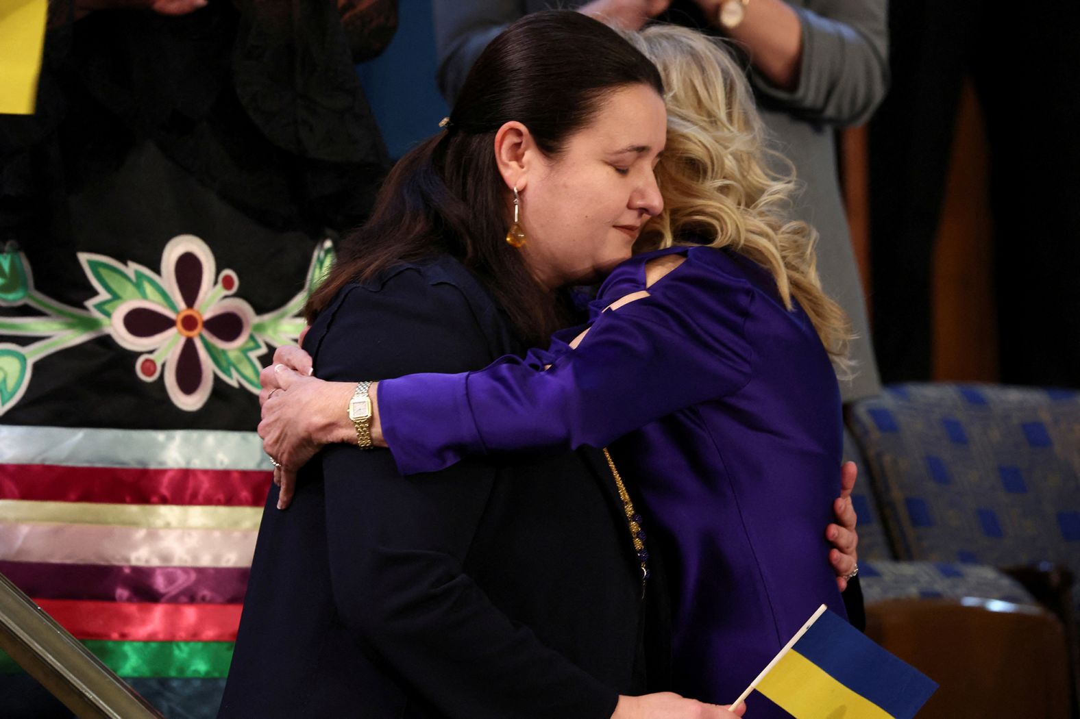 First lady Jill Biden embraces Ukrainian Ambassador to the US Oksana Markarova during President Joe Biden's first State of the Union address in 2022. After months of military buildup and brinkmanship, <a href="index.php?page=&url=https%3A%2F%2Fwww.cnn.com%2Finteractive%2F2022%2F05%2Fworld%2Fukraine-war-photographers-cnnphotos%2F" target="_blank">Russia launched an unprecedented assault </a>on Ukraine in late February. 