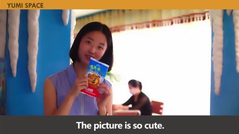 YuMi eats ice cream in Pyongyang, North Korea, in a YouTube video uploaded on August 1, 2022.