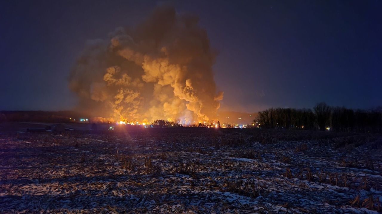 Flames erupt after a train derailment in East Palestine, Ohio, on Friday.