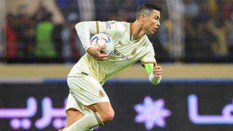 Nassr's Portuguese forward Cristiano Ronaldo runs with the ball after scoring a penalty during the Saudi Pro League football match between Al-Fateh and Al-Nassr at the Prince Abdullah bin Jalawi Stadium in al-Hasa on February 3, 2023. (Photo by Ali ALDAIF / AFP) (Photo by ALI ALDAIF/AFP via Getty Images)