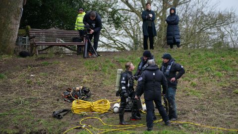 Specialist search teams from Lancashire Police beside the bench where Nicola Bulley's phone was found.