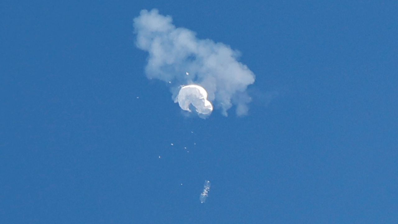The suspected Chinese spy balloon drifts to the ocean after being shot down off the coast in Surfside Beach, South Carolina, on February 4, 2023.  