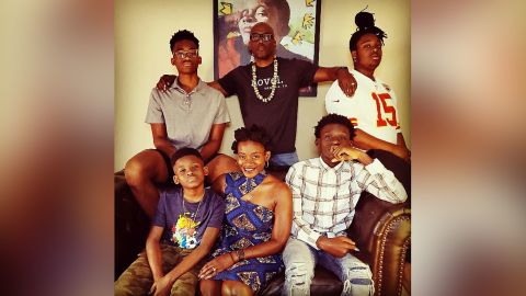 Author Derrick Barnes, center top, and his family.