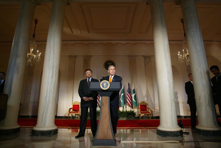 US President George W. Bush speaks to the media with Musharraf after they met at the White House in February 2002.