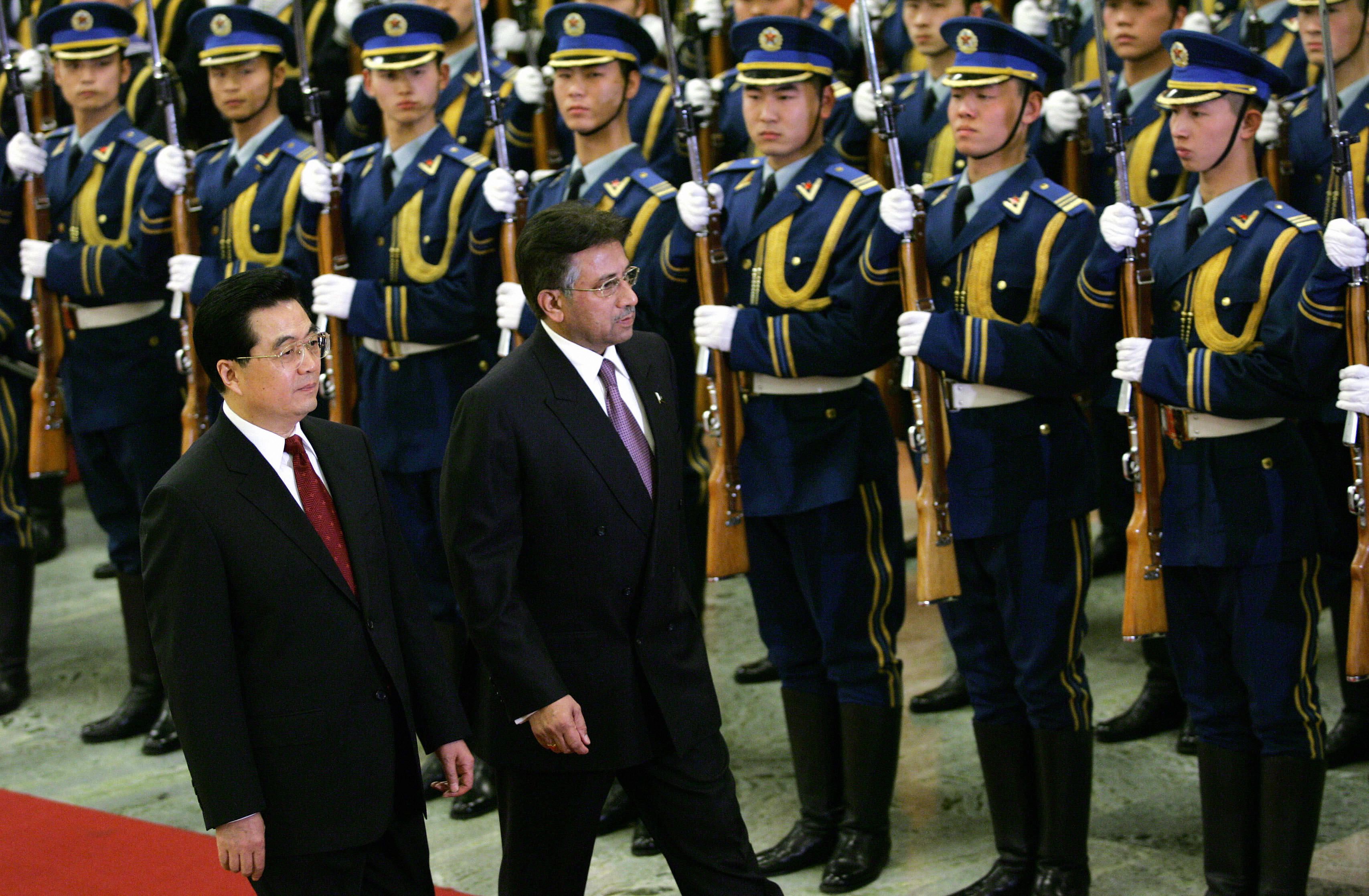 Musharraf and Chinese leader Hu Jintao inspect an honor guard in Beijing in February 2006.