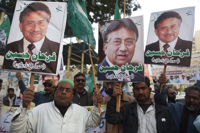 Musharraf supporters carry placards during a protest in Karachi following a special court's verdict in December 2019. Musharraf, living in self-imposed exile in Dubai, was <a href="index.php?page=&url=https%3A%2F%2Fwww.cnn.com%2F2019%2F12%2F17%2Fasia%2Fpervez-musharraf-death-sentence-pakistan-intl-hnk%2Findex.html" target="_blank">sentenced to death</a> in absentia after a three-member special court in Islamabad convicted him of violating the constitution by unlawfully declaring emergency rule while he was in power. <a href="index.php?page=&url=https%3A%2F%2Fwww.cnn.com%2F2020%2F01%2F13%2Fmiddleeast%2Fpervez-musharraf-pakistan-death-sentence-overturned-intl%2Findex.html" target="_blank">This ruling was overturned</a> in 2020.