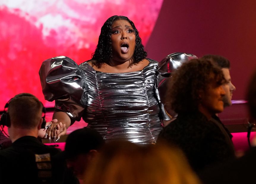 Lizzo reacts after "About Damn Time" <a href="https://www.cnn.com/entertainment/live-news/grammy-awards-2023/h_3e32bffe8dfcbb101f092feeb7b438e4" target="_blank">won the Grammy for record of the year</a>.