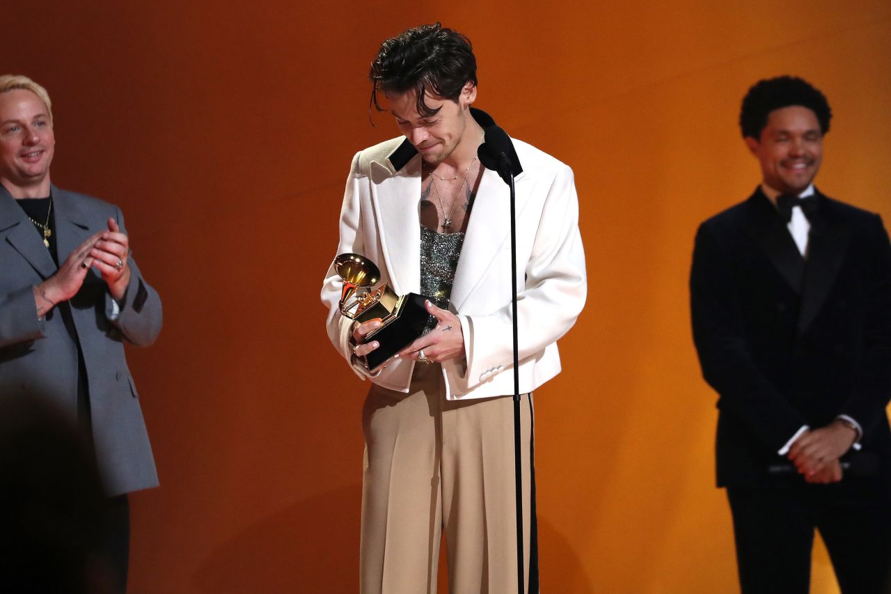 Harry Styles accepts the Grammy for album of the year (
