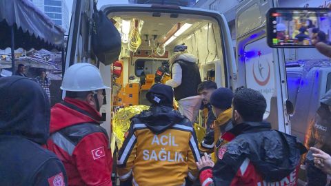 A woman is rescued from the wreckage of a building during ongoing search and rescue efforts in Gaziantep, Turkey, on Monday.  