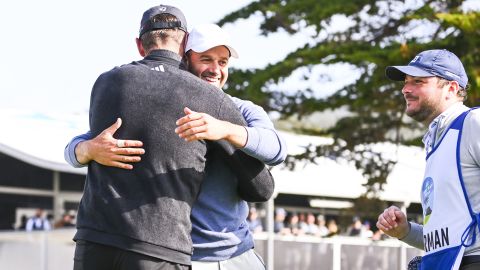 Rogers and Silverman hug.