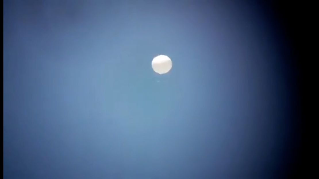 A picture taken from a video shows an airborne object flying above Colombia. CNN is unable to confirm if the images show a Chinese surveillance balloon. 