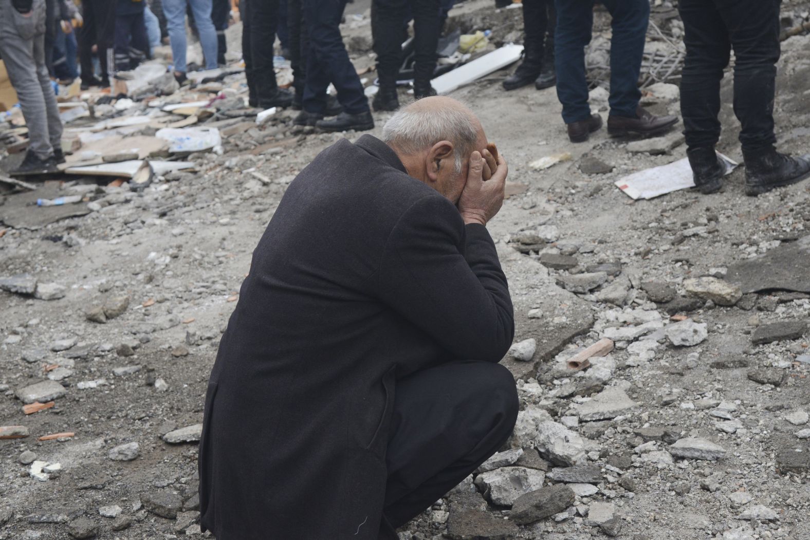 A man reacts as people search for survivors in Diyarbakir.