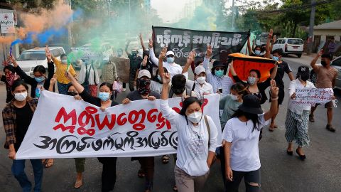 Anti-coup protesters march in Yangon, Myanmar on March 8, 2022 to mark International Women's Day.