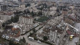 HATAY, TURKIYE - FEBRUARY 06: An aerial view of debris of a collapsed building after 7.7 magnitude earthquake hits Hatay, Turkiye on February 06, 2023. Disaster and Emergency Management Authority (AFAD) of Turkiye said the 7.7 magnitude quake struck at 4.17 a.m. (0117GMT) and was centered in the Pazarcik district in Turkiyeâs southern province of Kahramanmaras. Gaziantep, Sanliurfa, Diyarbakir, Adana, Adiyaman, Malatya, Osmaniye, Hatay, and Kilis provinces are heavily affected by the quake. (Photo by Ercin Erturk/Anadolu Agency via Getty Images)