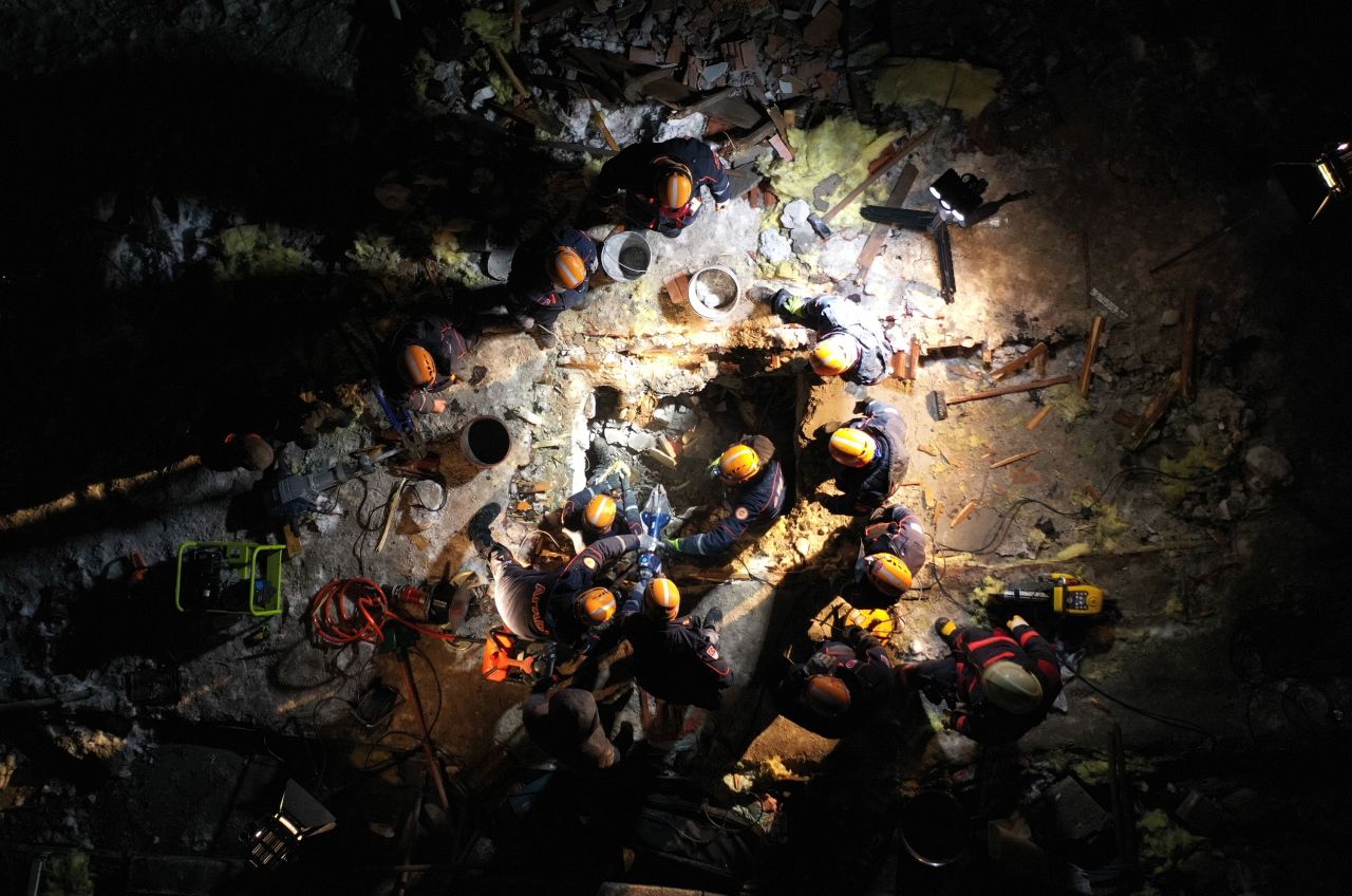 Search-and-rescue personnel work at a collapsed building in Malatya, Turkey, on February 6.