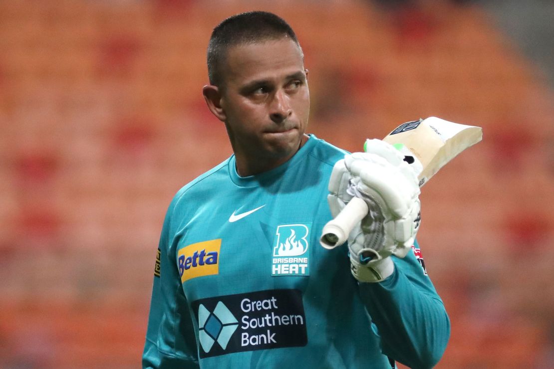 Khawaja salutes the crowd during the Big Bash League match between the Sydney Thunder and the Brisbane Heat last month.