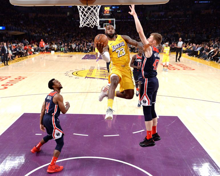 James signed a free agent deal with the Los Angeles Lakers in July 2018. Here, he drives to the basket during a home game against Washington in November 2019.