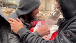 father weeps infant son syria earthquake