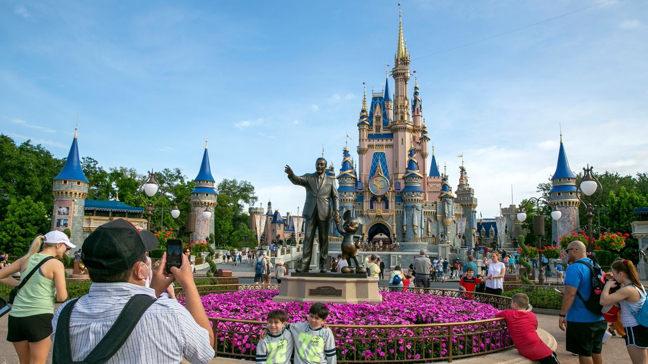 People visit Magic Kingdom Park at Walt Disney World Resort in Lake Buena Vista, Florida, on April 18, 2022.