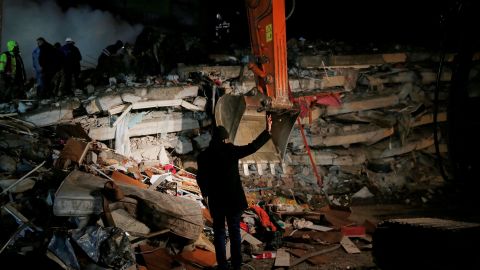 A rescue team works on a collapsed building, following an earthquake in Osmaniye, Turkey, on Monday.