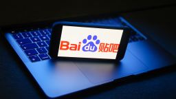 Baidu logo displayed on a phone screen and a laptop are seen in this illustration photo taken in Krakow, Poland on November 27, 2022. (Photo by Jakub Porzycki/NurPhoto via Getty Images)