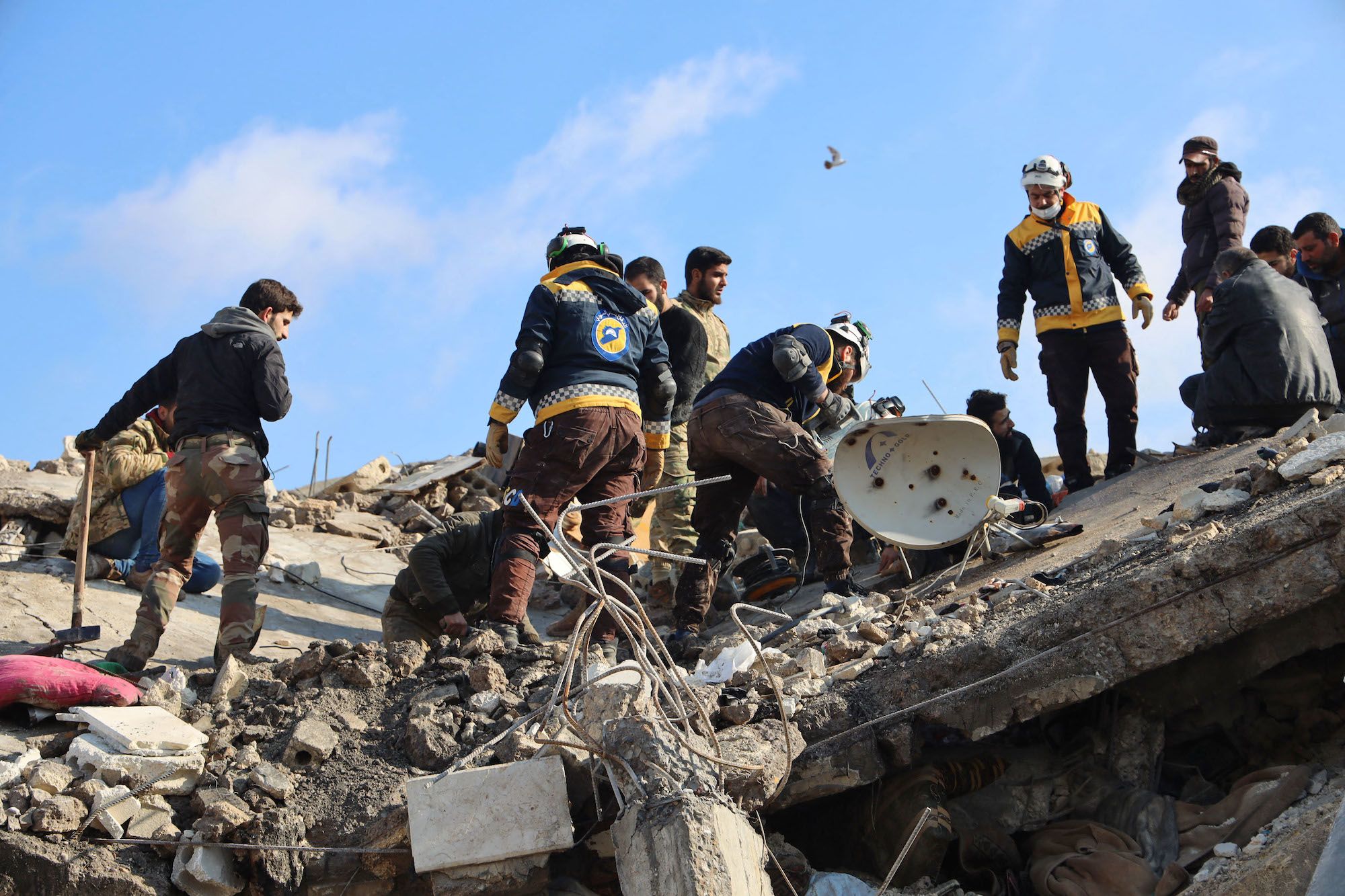 Rescue workers save people from a building fire in Pakistan