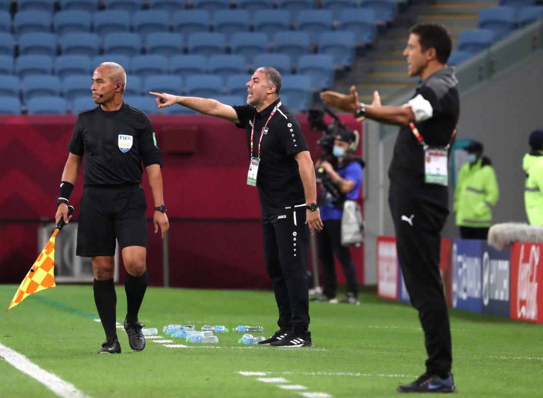 Makram Daboub (C) became the Palestinian national team's official coach in 2021.