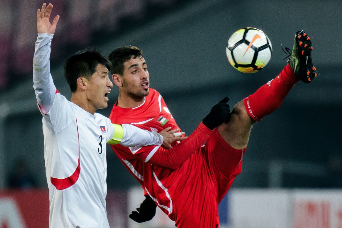 Oday Dabbagh, who plays club football in Portugal, is pictured playing for the
Palestinian national team against Song Kum Song of North Korea during the 2018 AFC Under-23
Championship in Jiangyin city, east China's Jiangsu province, in January 2018.