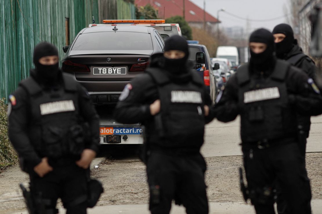 Romanian officials transport cars seized from the Tate compound to an undisclosed storage location, from Voluntari, Ilfov, Romania on January 14, 2023.