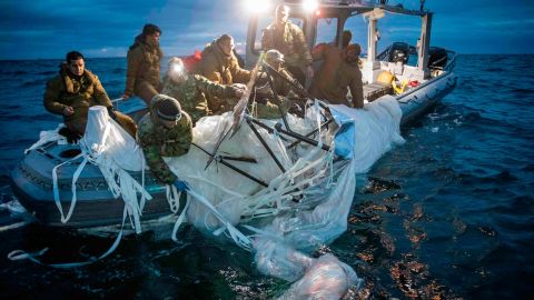 Sailors recover a high-altitude  balloon off the coast of South Carolina on February 5, 2023. 