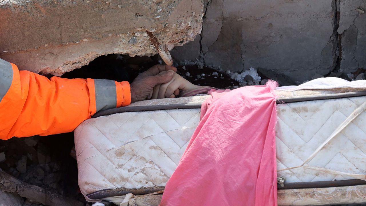 Seven members of his family ended up under the rubble, Hancer told CNN Turk.