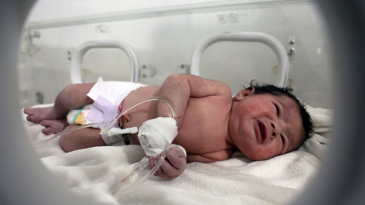 A baby girl receives treatment inside an incubator at a children's hospital in Afrin, Syria, on Tuesday.