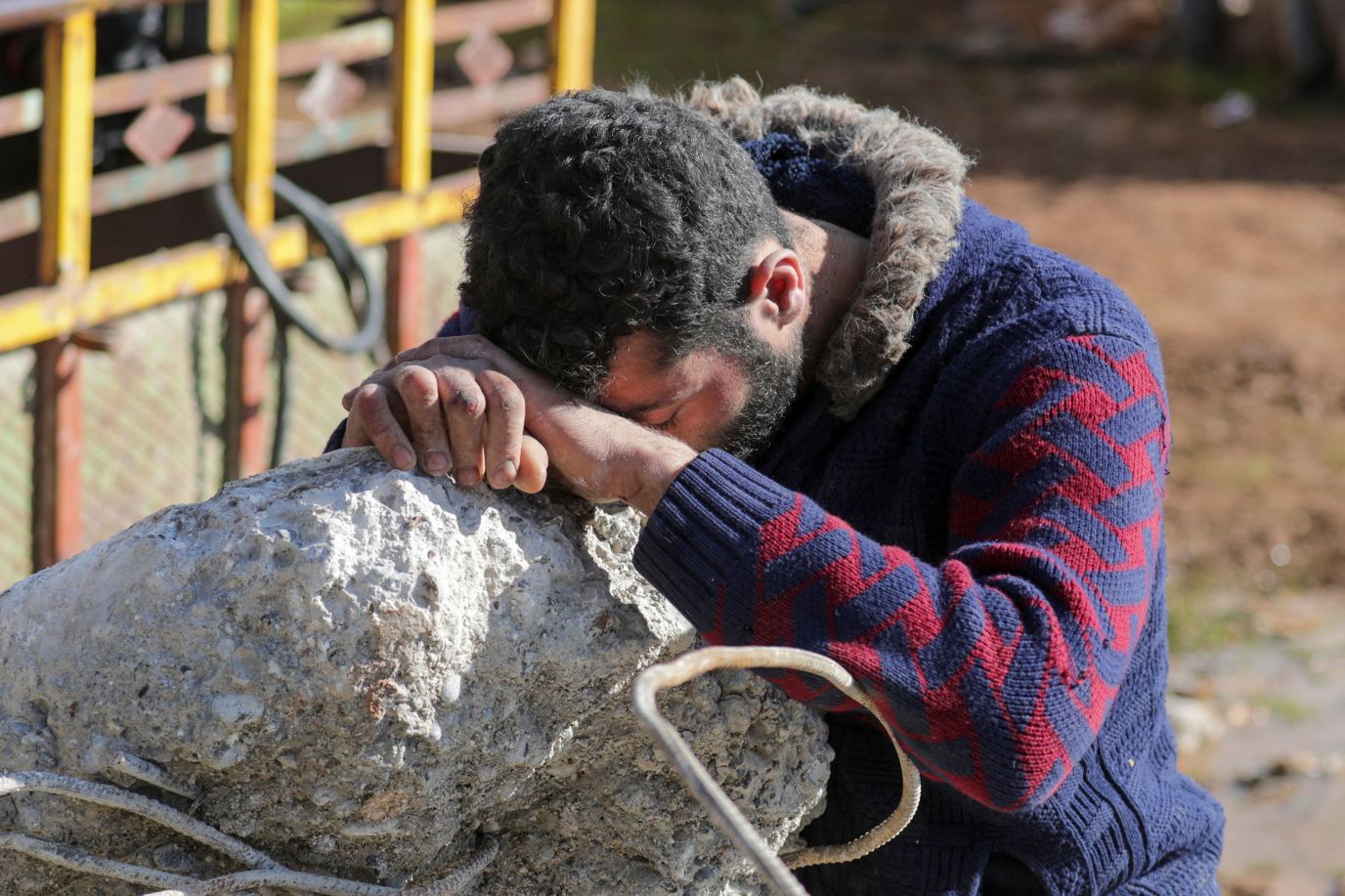 A man reacts in Jandaris, Syria, on February 7.
