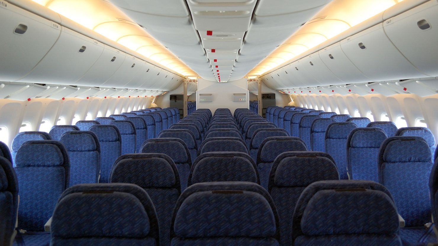 Inside a passenger aircraft cabin.