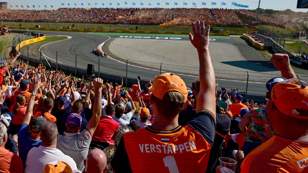 Spectators react as Verstappen drives ahead of the Dutch Formula One Grand Prix at the Zandvoort circuit on September 3, 2022.