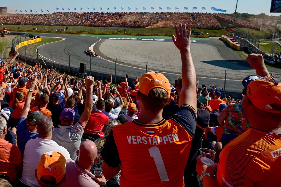 Spectators react as Verstappen drives ahead of the Dutch Formula One Grand Prix at the Zandvoort circuit on September 3, 2022.