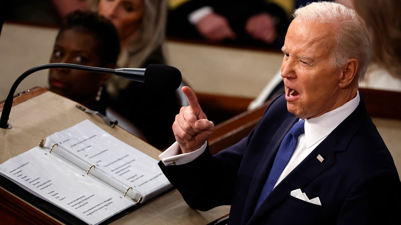 President Joe Biden points while delivering his State of the Union address.
