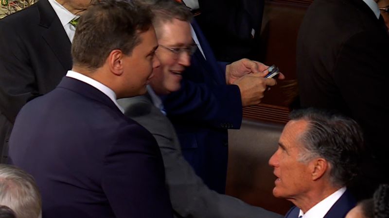 ‘You don’t belong here’: See tense confrontation between Romney and Santos | CNN Politics
