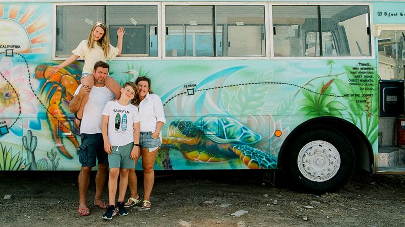 NextImg:This family of four are driving around Asia in a bus | CNN