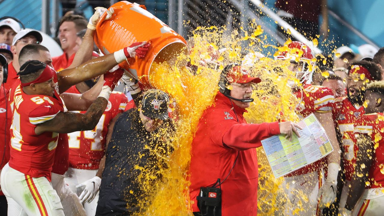 Kansas City Chiefs head coach Andy Reid is dunked with Gatorade by his players Jordan Lucas (24) and Cameron Erving (75) in the fourth quarter against the San Francisco 49ers in Super Bowl LIV at the Hard Rock Stadium on February 2, 2020, Miami Gardens, Florida.