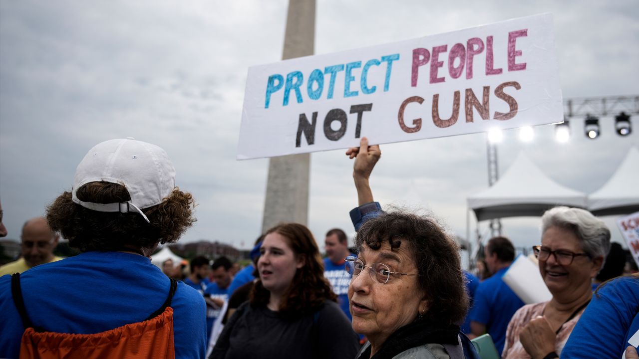 Demonstrators attend a March for Our Lives rally against gun violence at the base of the Washington Monument on the National Mall in Washington, DC, on June 11, 2022.