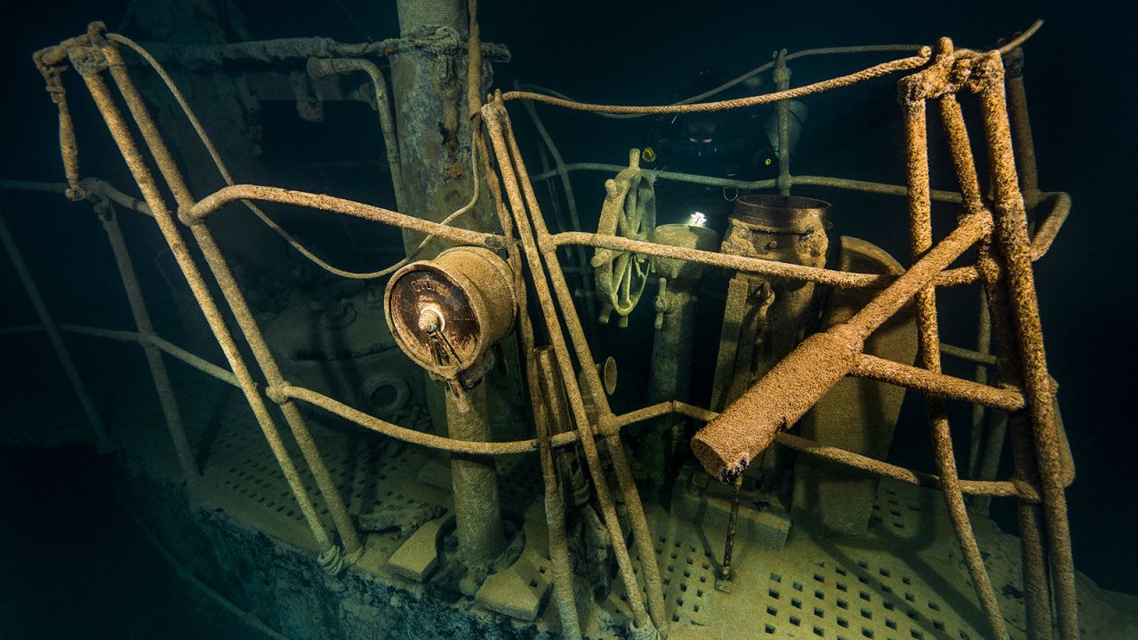 <strong>Underwater photography: </strong>On dives, Dahm captures haunting photographs, including this one of an unidentified Russian submarine from the First World War. Dahm and Douglas also extensively research the wrecks they explore.