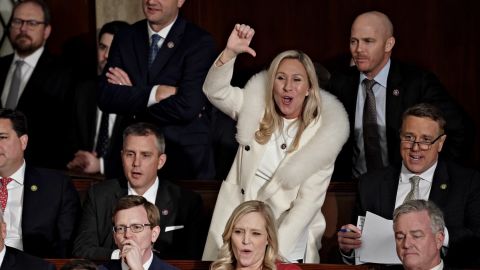 Rep. Marjorie Taylor Greene, center, gestures during President Joe Biden's State of the Union address on Tuesday, February 7, 2023. 