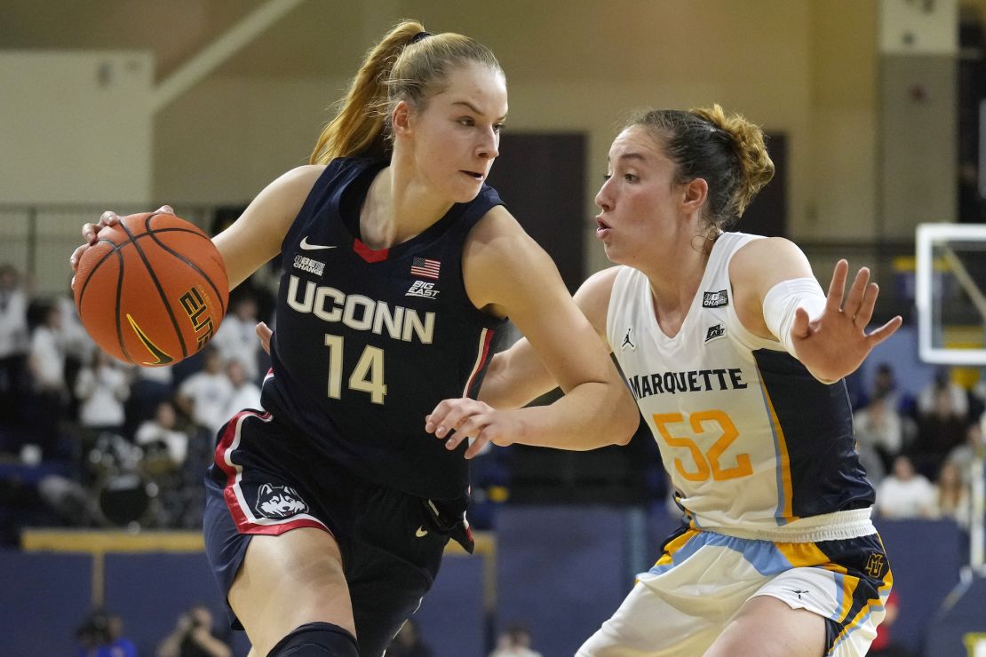 Chloe Marotta (right) scored 19 points for the Golden Eagles, which marked the first time Marquette defeated the Huskies in 17 meetings.