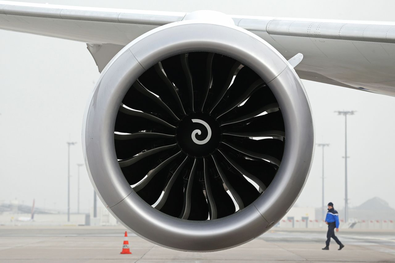 The engine of a Boeing 787-9 Dreamliner is seen as the aircraft sits on the tarmac at Charles de Gaulle Airport in Paris. 