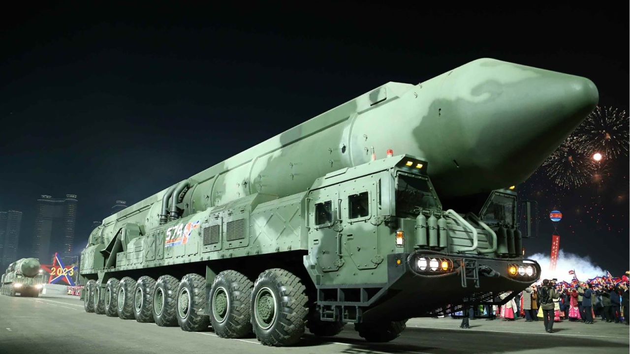 A mockup of what analysts think could be a new North Korean solid-fueled intercontinental ballistic missile is paraded in Pyongyang on Wednesday night in image from state-run media.