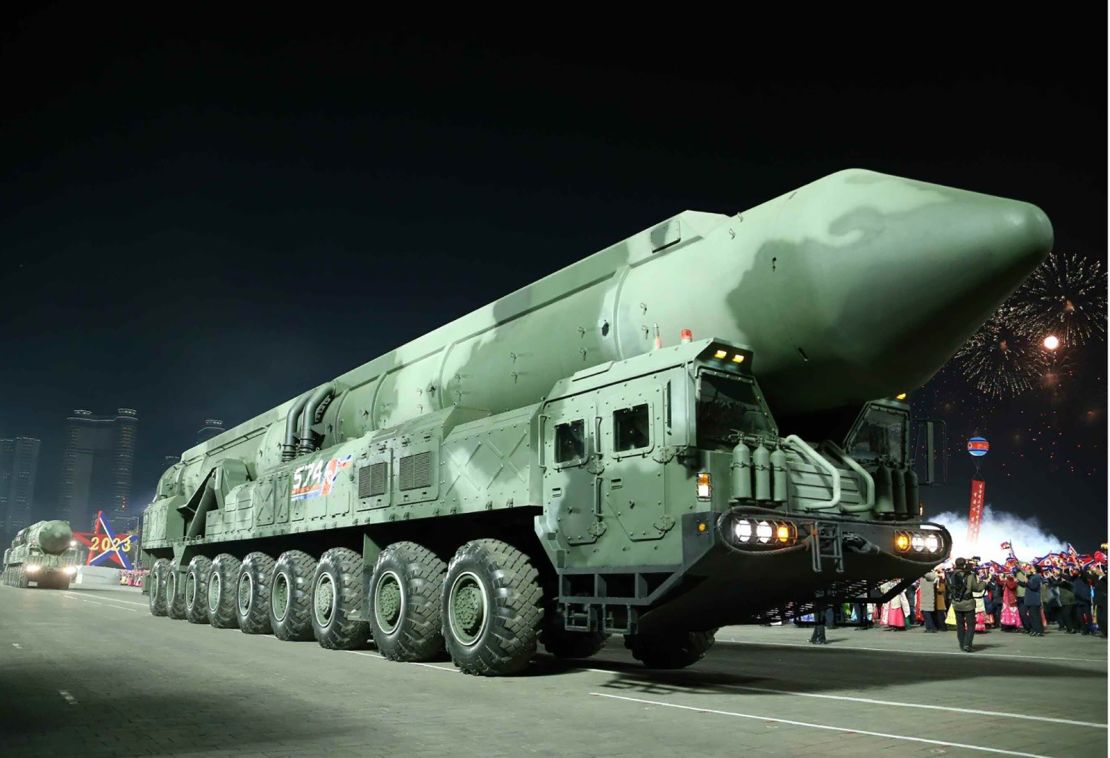 A mockup of what analysts think could be a new North Korean solid-fueled intercontinental ballistic missile is paraded in Pyongyang on Wednesday night in image from state-run media.