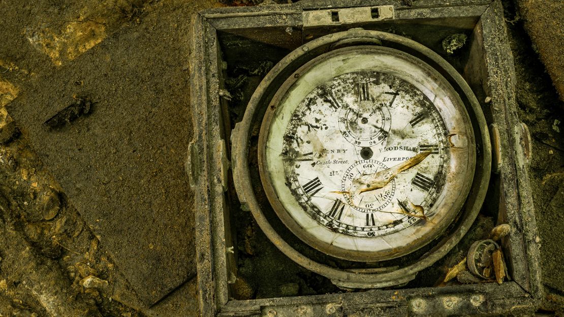 This is a close-up shot of a ship's chronometer -- a type of clock -- on one of the wrecks.