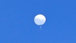 A suspected Chinese spy balloon drifts above the Atlantic Ocean off the coast of the Carolinas before being shot down on February 4, 2023. 