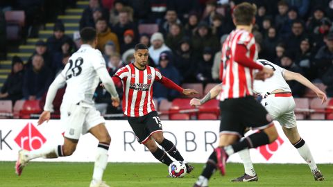 Max Lowe of Sheffield United keeps possession of the ball during the Championship match against Stoke City at Bramall Lane on January 14, 2023 in Sheffield.